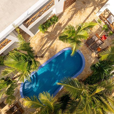 Karibu Beach Resort Pongwe Bagian luar foto